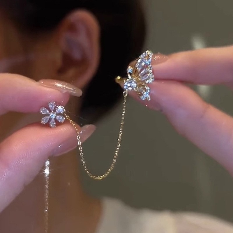 Mariposa amor flor oído hueso clip oreja línea integrada pendientes nicho diseño de alto grado de luz de lujo clip de oreja temperamento borla pendientes