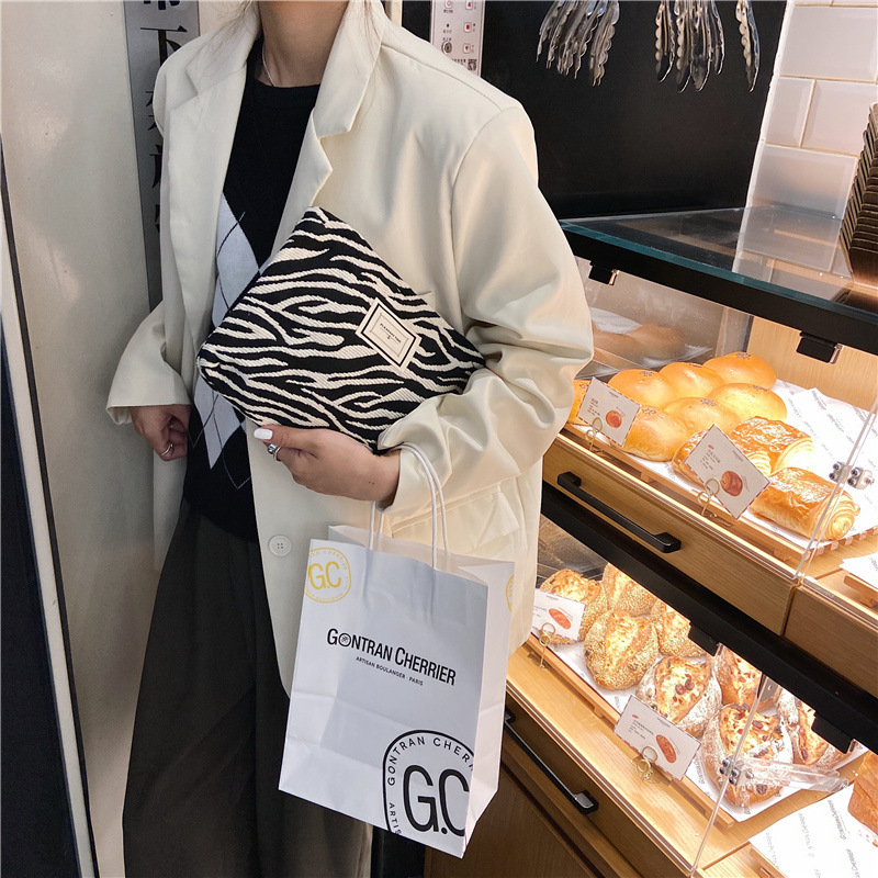 13314 Corea del Sur moda leopardo patrón cosmético bolsa de embrague de las mujeres lona conveniente lavado bolsa de almacenamiento al por mayor