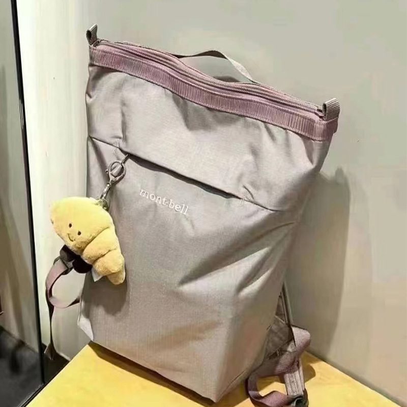 スポットモンベルバックパック女性のアウトドアレジャー旅行バッグコンピュータバックパック男の子 10L 大容量スクールバッグ