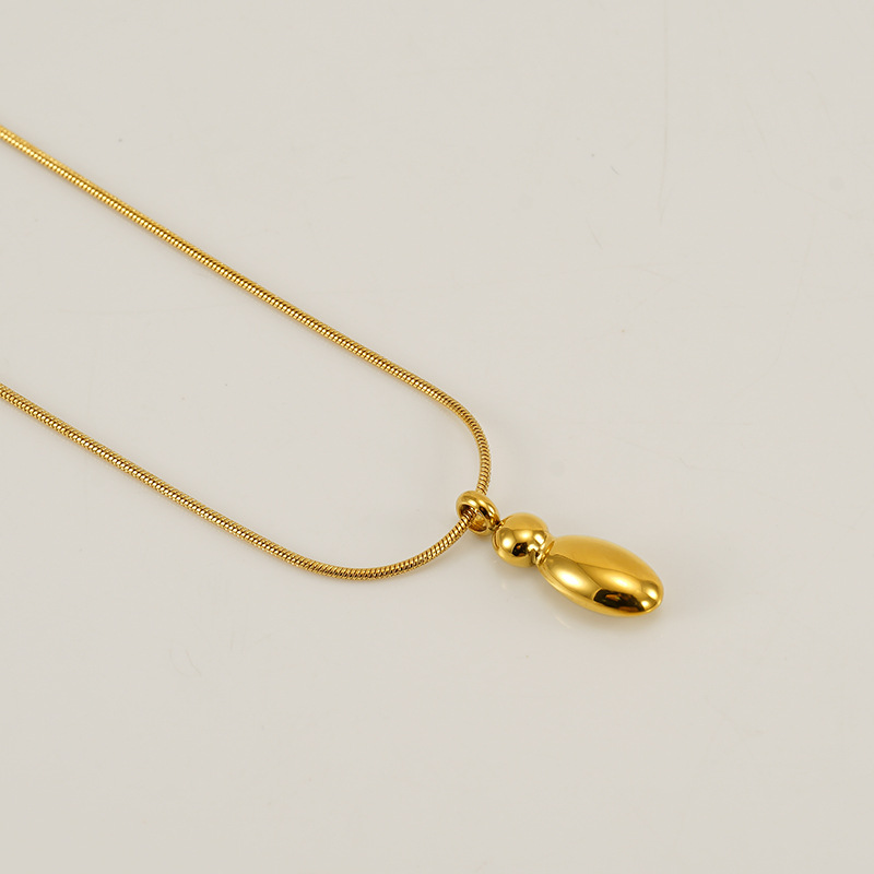 Burbujas transfronterizas 26 letras inglesas colgante brillante collar nicho universal oro acero titanio joyería collar