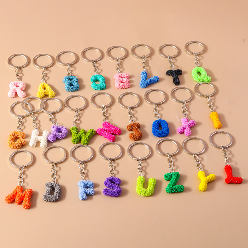 Simple Style Letter Resin Bag Pendant Keychain display picture 1