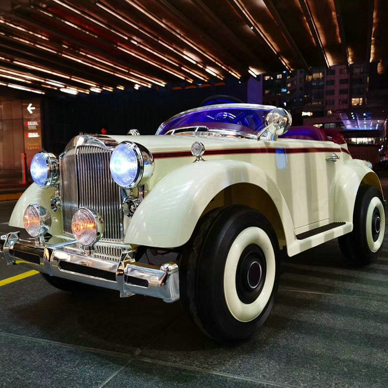 Coche eléctrico para niños El coche clásico de control remoto para bebés macho y hembra puede sentarse en las cuatro ruedas con tracción en las cuatro ruedas, coche de juguete oscilante recargable