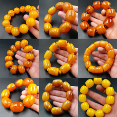 大きいサイズのミツロウのブレスレットの鶏油の黄色のミツロウの色の桶の玉の丸い手の串の二世代のミツロウの琥珀のアクセサリーの生放送の贈り物