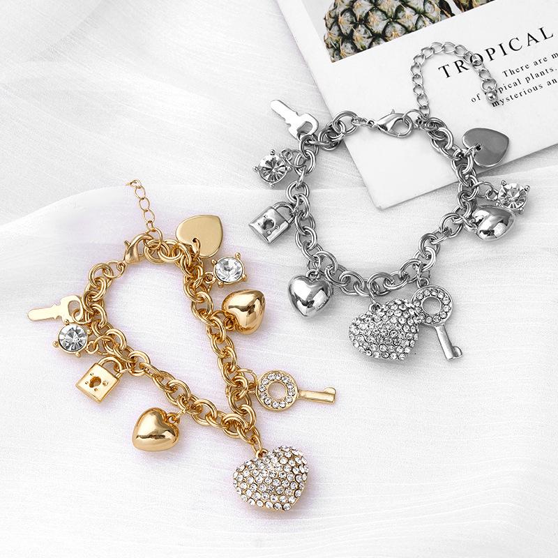 European and American love lock jewelry personality full diamond peach heart gold and silver bracelet female diamond crystal bracelet vintage bracelet direct sales European and American love lock jewelry personality full diamond peach heart gold and silver bracelet female diamond crystal bracelet vintage bracelet direct sales