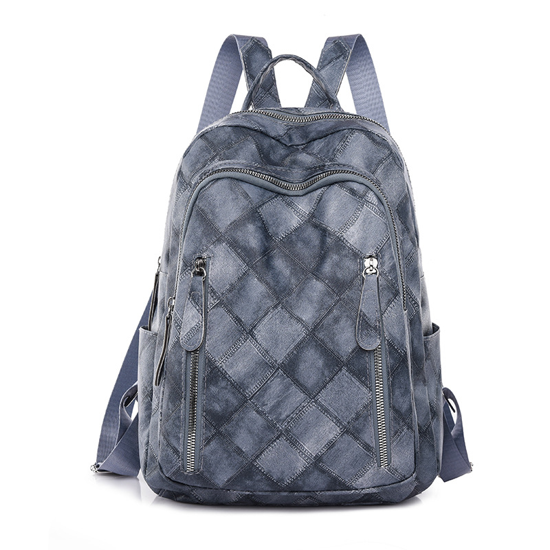 Spot al por mayor 2023 nueva mochila de cuero suave para mujer retro casual moda rombo urbano simple mochila marea