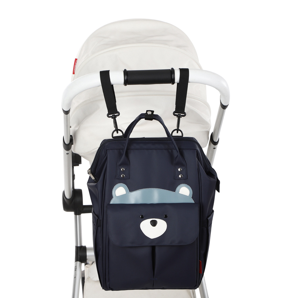 Mochila de dibujos animados de moda multifuncional bolso de la momia mochila impermeable portátil de gran capacidad madre y bebé fuera mochila transfronteriza