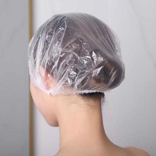 Disposable shower cap wholesale waterproof thickened shower and barber shop oil hair mask hair dye care 100 pieces earmuffs