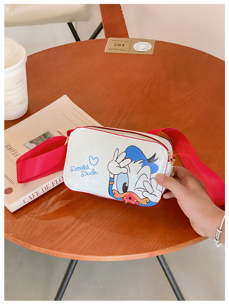 The 2025 new children's mobile phone bag is a trendy, fashionable, fresh, sweet, cartoonish, creative and simple single-shoulder crossbody bag for women undefined