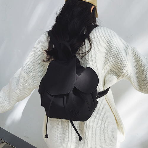 Japanese minimalist monochrome casual dual-shoulder bag with unique sense of lightness and versatility for travel, small backpack for women