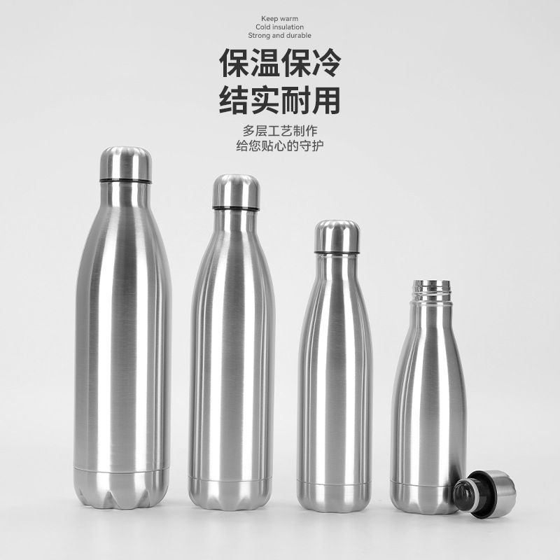 Botella de cocaque de acero inoxidable Amazon 304 con manija Taza de vacío de doble capa Botella deportiva de bala portátil