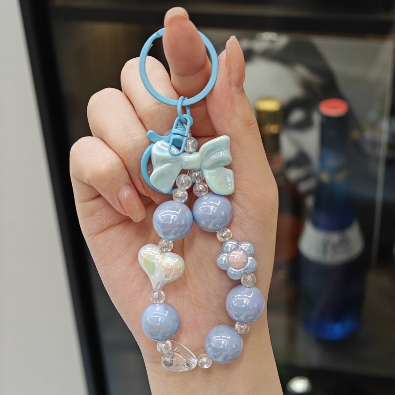 Creativo pequeño color caramelo fresco color chapado con cuentas llavero arco amor llavero bolsa pequeña colgante fuente