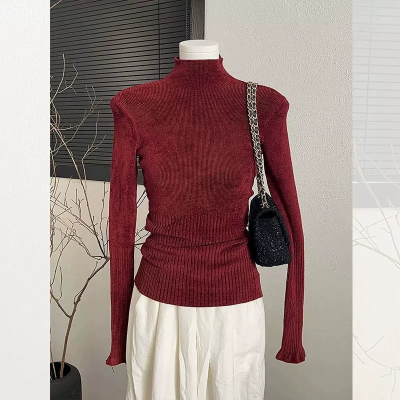 Black colored knitted fitted base body-friendly sweater, high collar