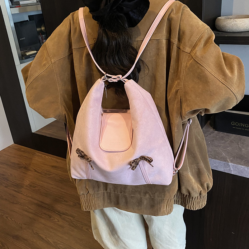 Nueva versión coreana de la mochila para niños y niñas, mochila para bebés de gran capacidad, mochila para bebés, mochila para niños con arco lindo.