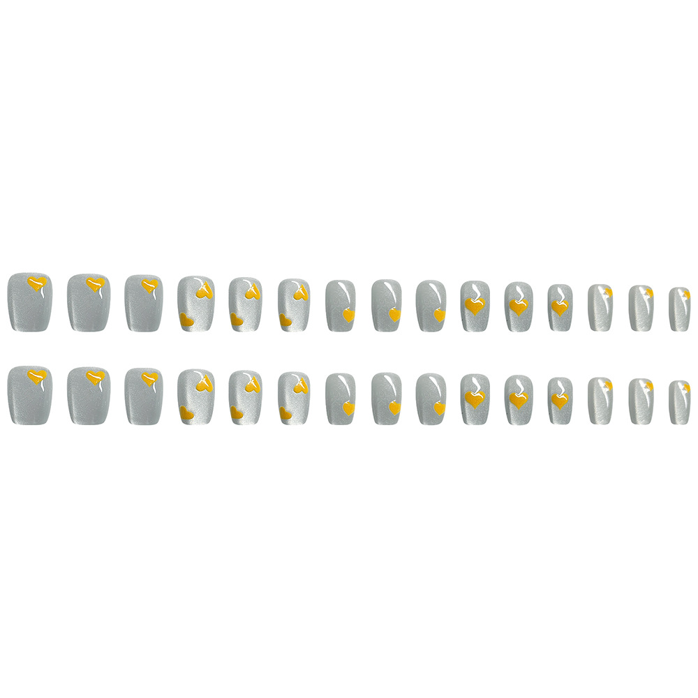 Ventas de chatarra encantadoras uñas de corazón amarillo dulce parche de uñas de ballet corto 30 piezas de uñas de ojo de gato
