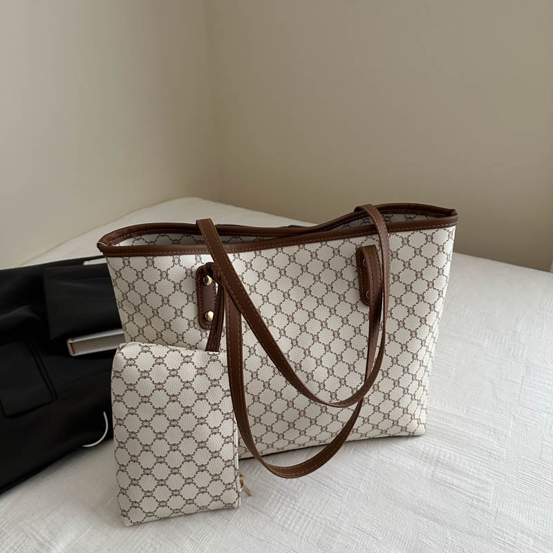 Bolso de alta calidad de gran capacidad 2025 nuevo bolso de viaje de todo fósforo de nicho para mujer bolso de niño de moda para mujer bolso portátil para mujer
