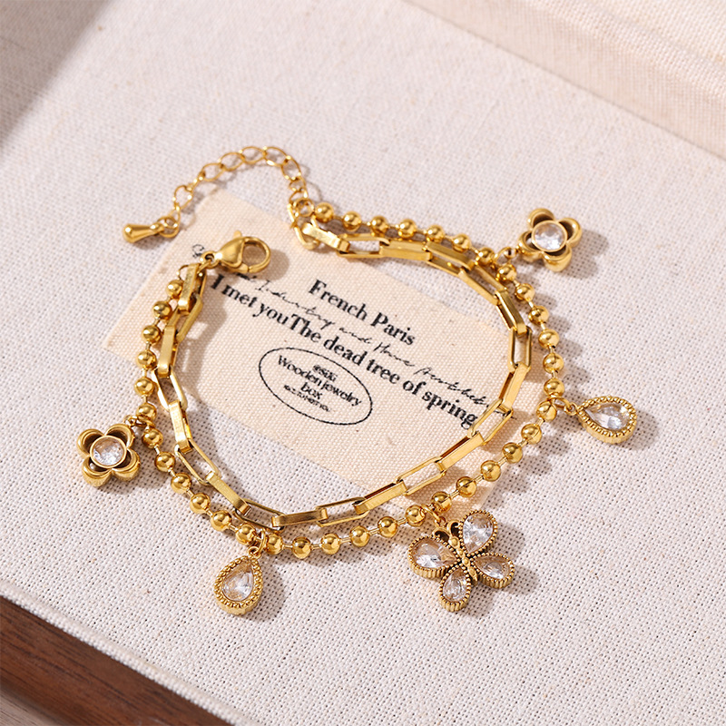 Tina Europa y los Estados Unidos transfronterizos inswind exquisita mariposa flor diseño de modelado pulsera de zircon ligera lujosa nicho joyería de mano mujer