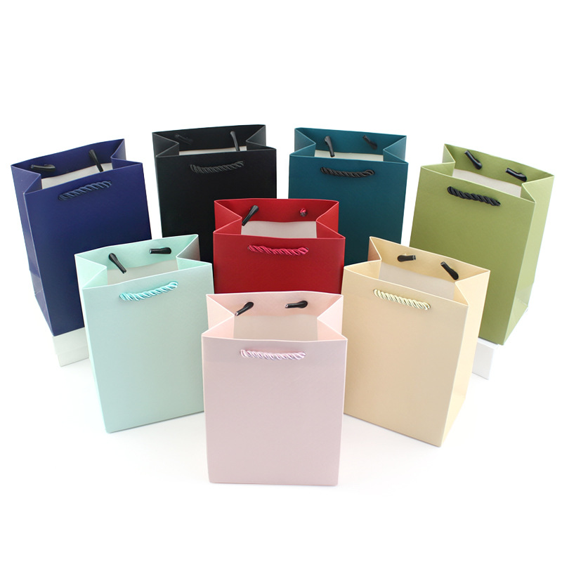 牛皮纸饰品包装手提袋彩色印刷白卡纸袋礼品手提袋定  做LOGO