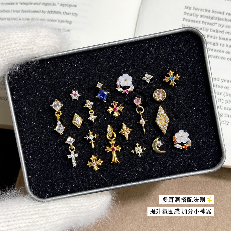 Titanium alloy earrings, 0.9mm internal thread, gold-colored, featuring small floral and cross designs, ear cartilage studs, copper, cubic zirconia, and titanium steel Titanium alloy earrings, 0.9mm internal thread, gold-colored, featuring small floral and cross designs, ear cartilage studs, copper, cubic zirconia, and titanium steel