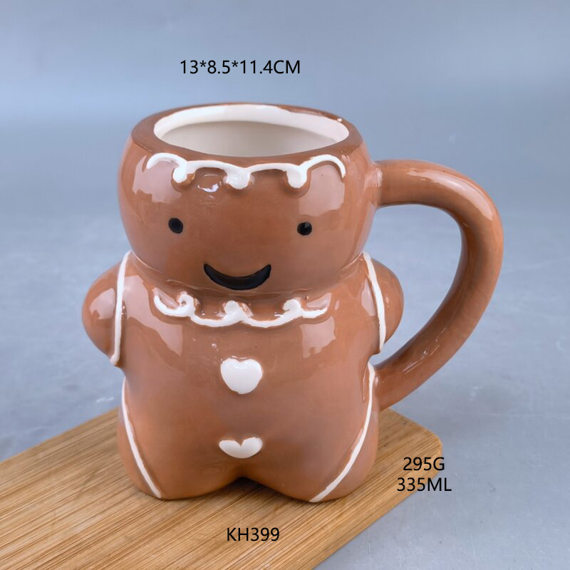 Spot Navidad Cerámica linda de dibujos animados Gingerbread Man Creative Taza de Navidad de alto valor Taza de café con leche
