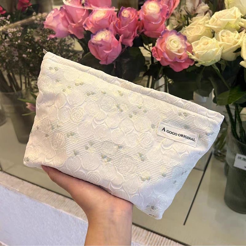 Bolsa de cosméticos de gran capacidad portátil fresco pequeño floral ins bolsa de almacenamiento bolsa de lavado elegante bolsa de almacenamiento jacquard