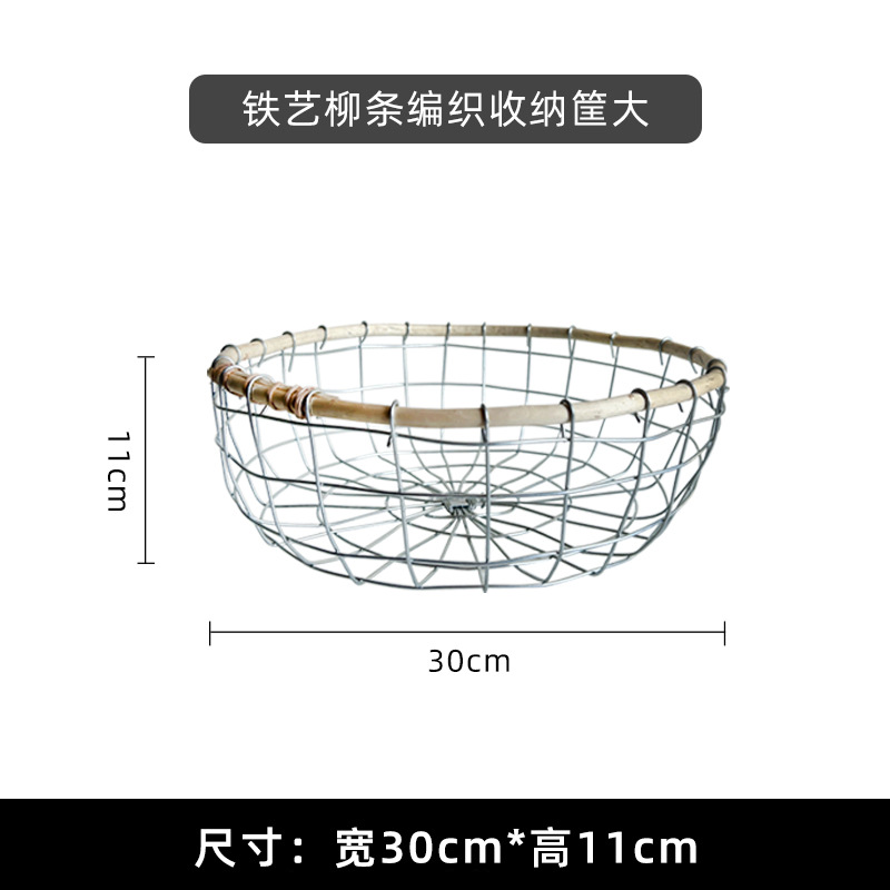 手作りの鉄芸の果物かごの卵かごの家庭用パンのお菓子のデザートかごの透かし彫りの収納かごのテーブルの上の物かご