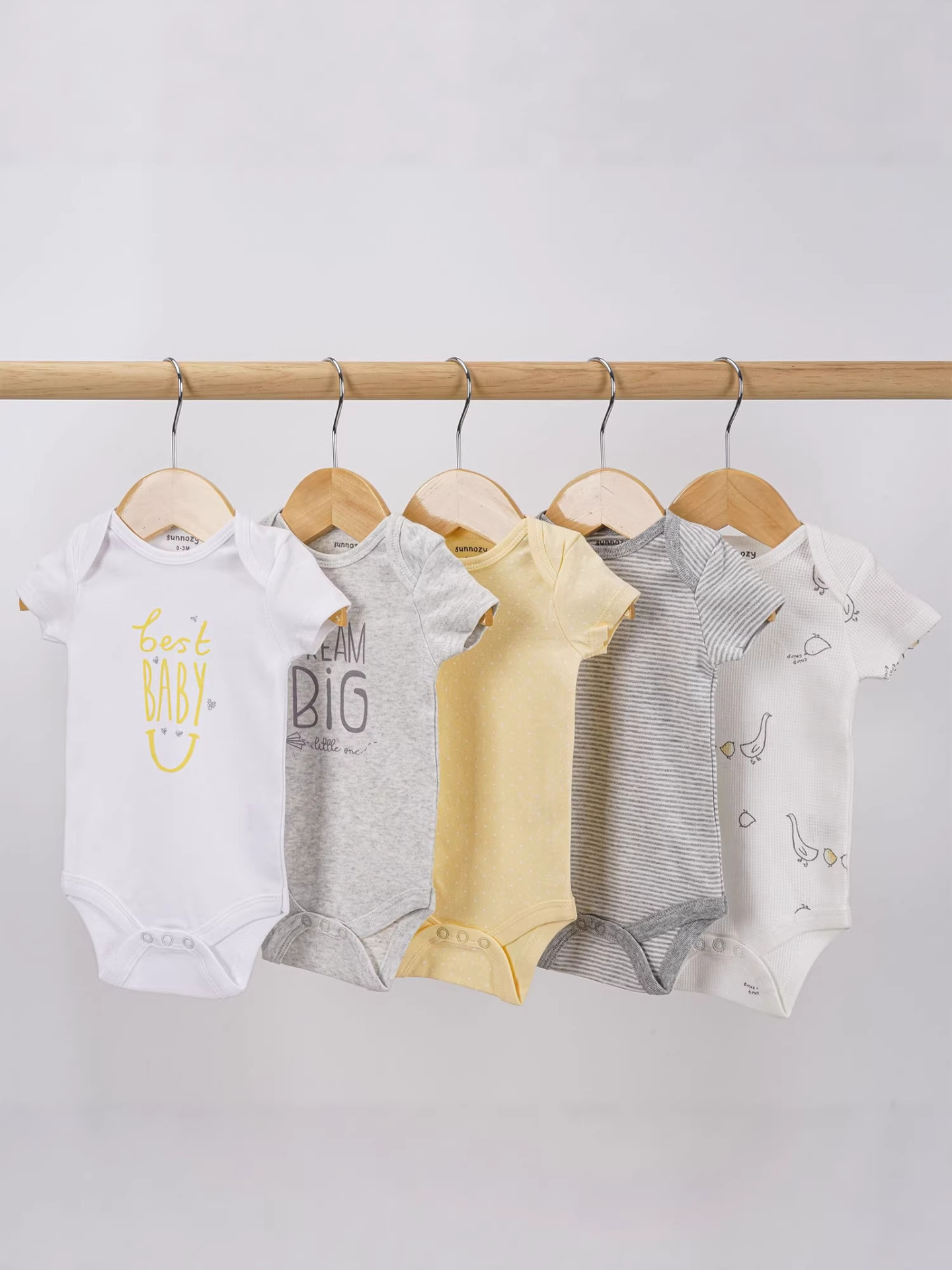 Bebés y bebés Sunnozy comercio exterior lindos mangas cortas chaqueta de triángulo conjunto de escalada fábrica al por mayor
