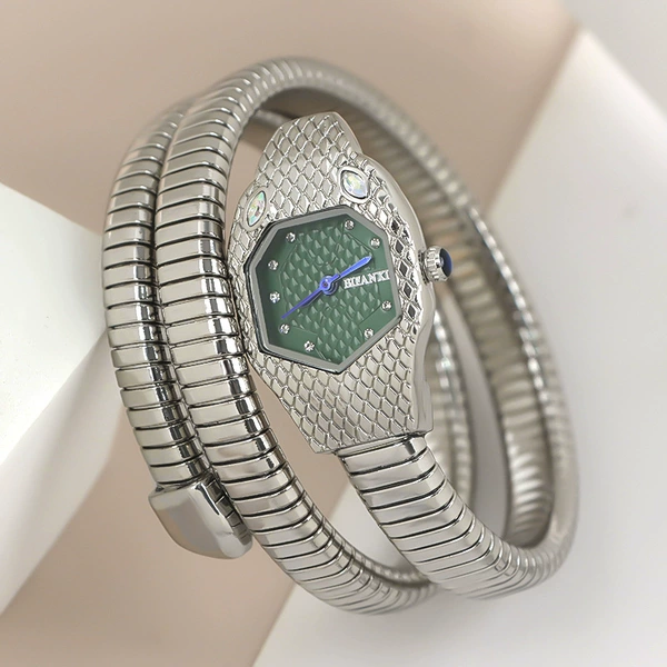 Silver, green dial