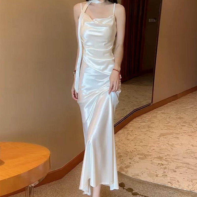 This year's popular satin camisole dress for women is the new 2026 summer style, featuring a high-end feel, waist-cinching design, slimming effect, and elegant long skirt
