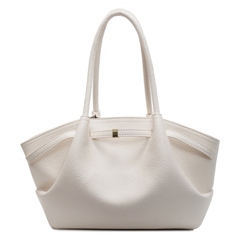 Nicho de diseño de bolsas de cubo de mano para mujeres 2025 nuevo estilo de moda de hombro bolsas de viaje de estilo retro bolsas de brazo