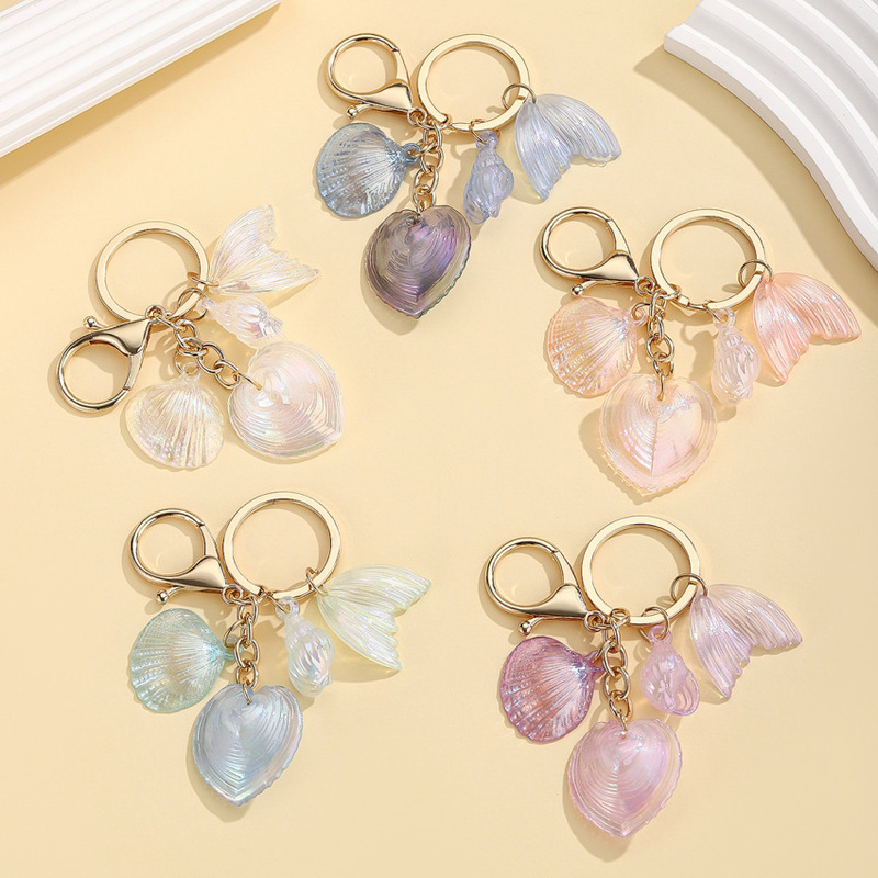 Cross-border hot-selling creative personality seaside holiday colorful simulation shell conch sea star five-pointed star key chain pendant