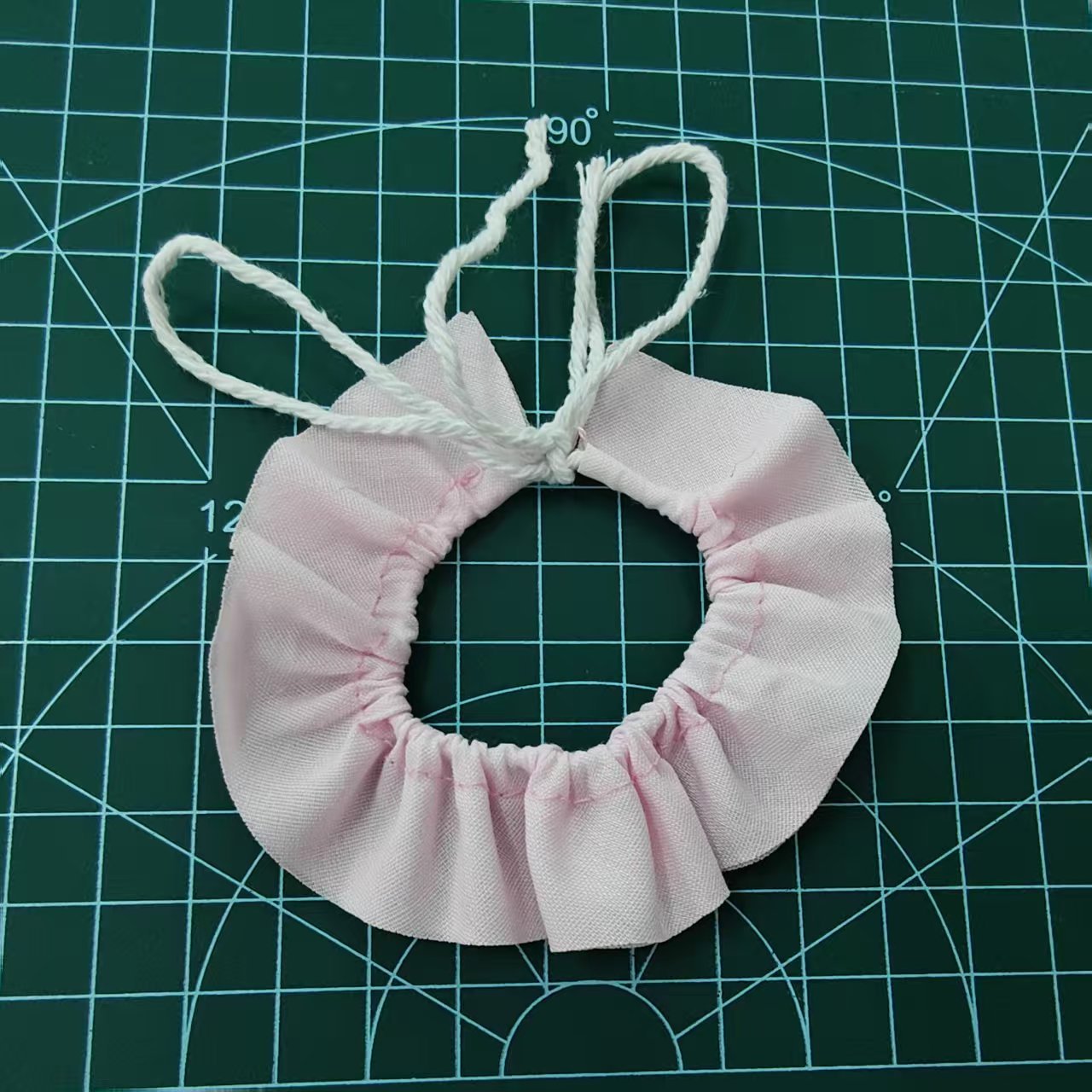 Pink ruffle collar