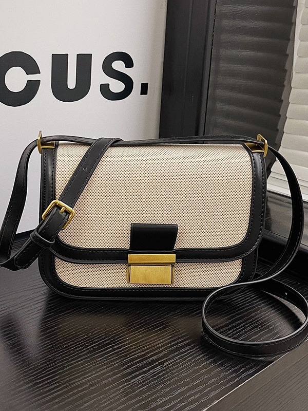 Alta sensación retro bolso pequeño para mujeres 2025 nueva moda transfronteriza color contrastante empalme viaje mochila de hombro