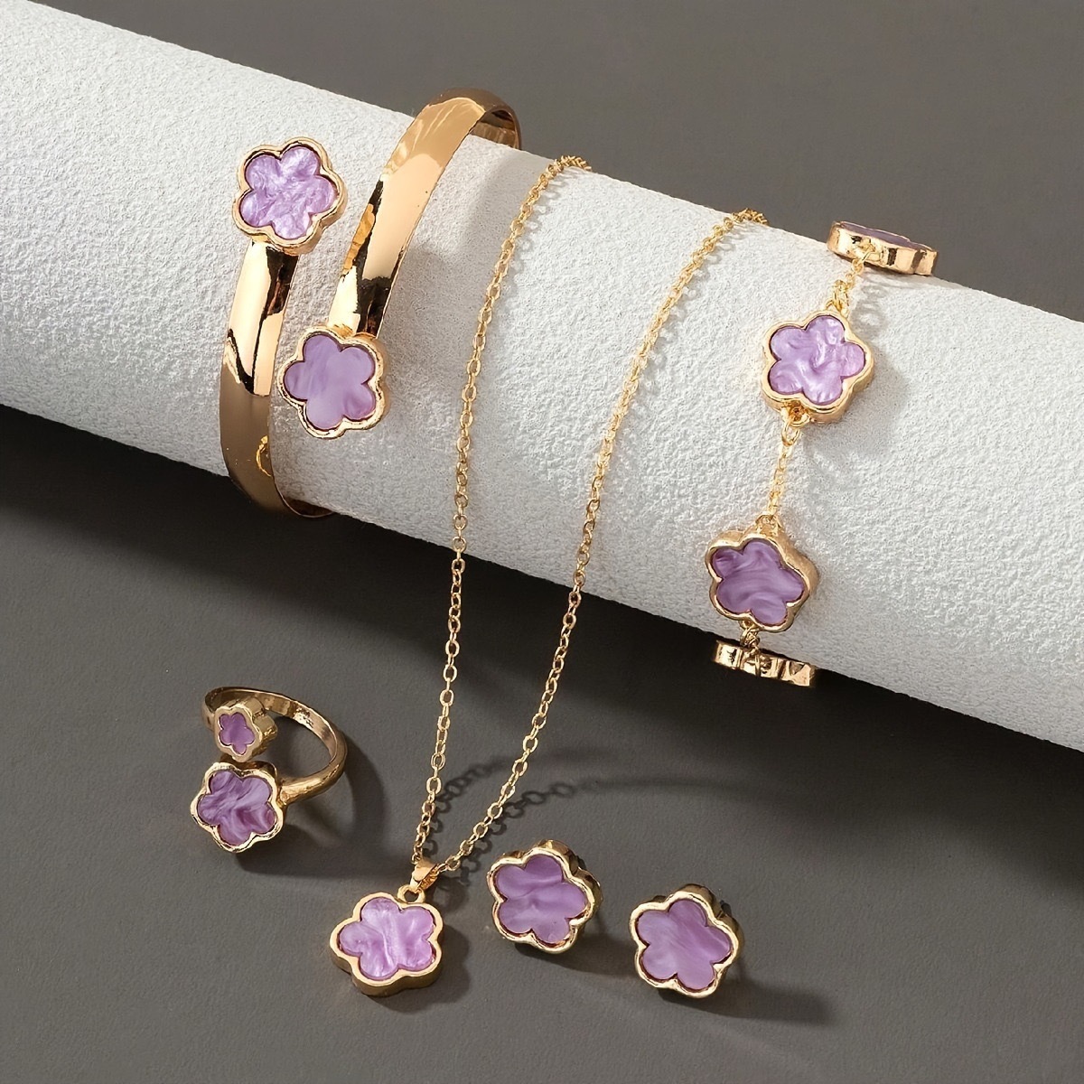 Explosiones transfronterizas pétalos de cinco hojas set de cinco piezas collares pulseras pulseras pendientes anillos set de joyas de moda europea y americana mujer