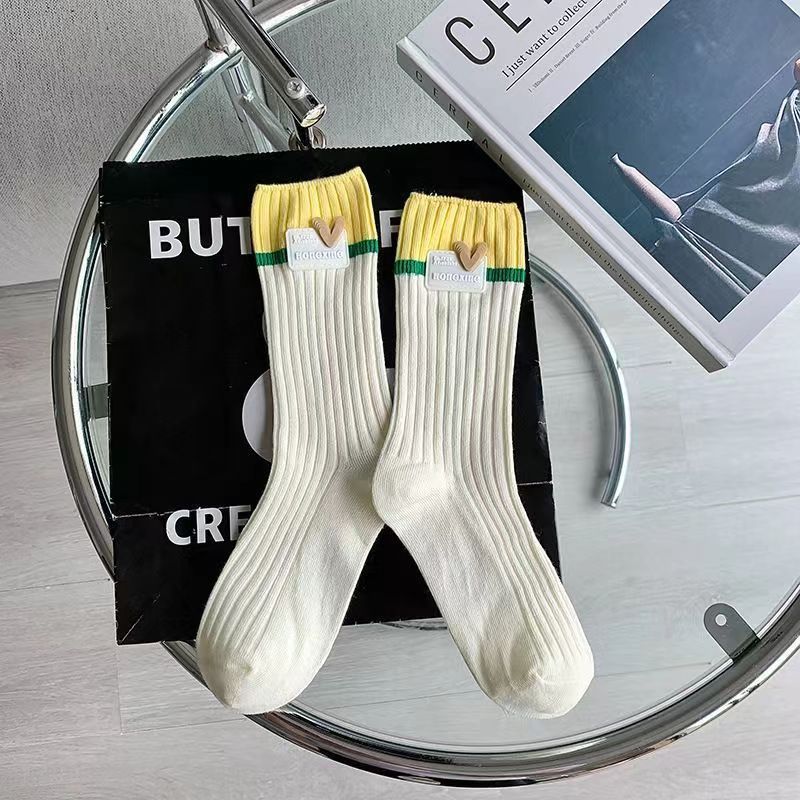 Calcetines de algodón de color puro calcetines de mujer de otoño e invierno a media pantorrilla calcetines de dopamina desgaste ins moda doble aguja amor Rosa pila Calcetines