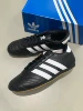 Taekwondo black lace-up (shoes are half a size too small)