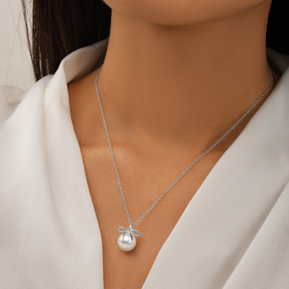 Sterling Silber Süss Einfacher Stil Überzug Inlay Bogenknoten Künstliche Perlen Halskette Mit Anhänger display picture 3
