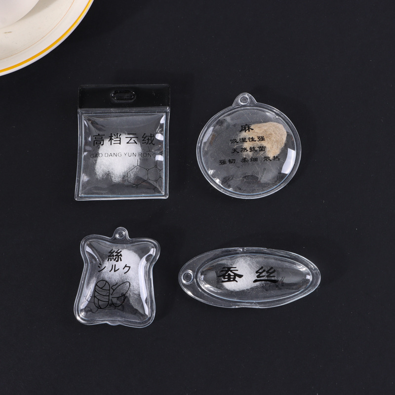 Custom PVC transparent down-filled inflatable tags, clothing hang tags, down jacket inflatable tags, wholesale duck feather down balls Custom PVC transparent down-filled inflatable tags, clothing hang tags, down jacket inflatable tags, wholesale duck feather down balls