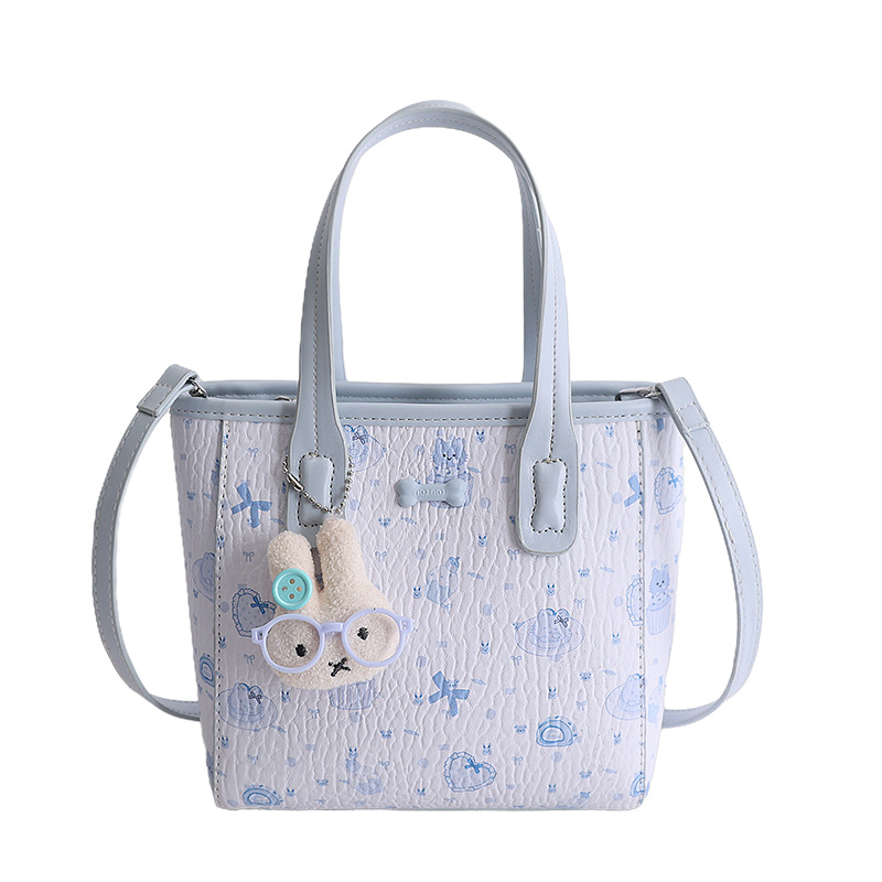Fresco dulce popular impresión bolsos personalidad extranjera versátil bolsos de mochila de moda diaria bolsos de cubo portátiles