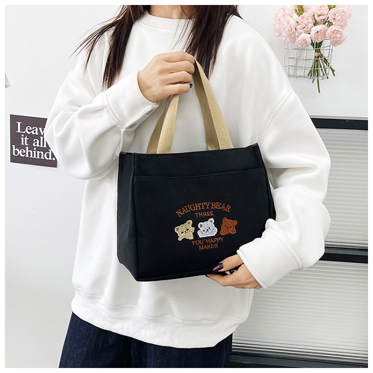 New wholesale fashionable and high-quality canvas handbag, simple and portable, easy to carry for going out, versatile lunch box and bento bag undefined