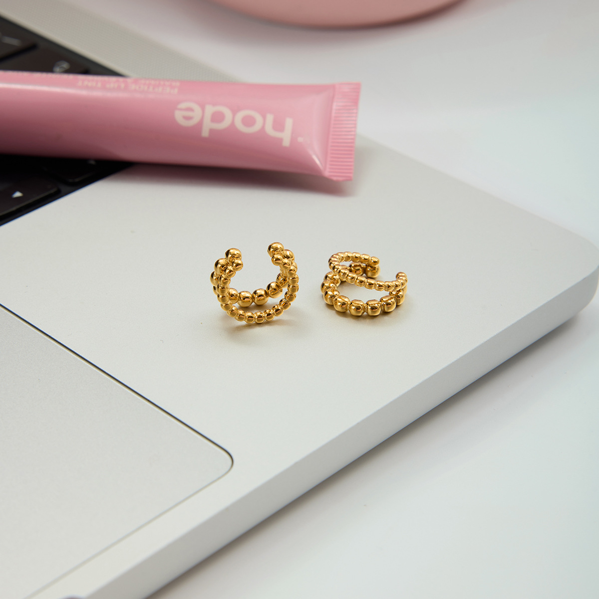Wanxing Europa y los Estados Unidos sin agujeros de orejas de orejas de bolas de doble capa de orejas de oro 18 quilates personalidad de moda pendientes de cabello
