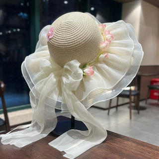蕾丝蝴蝶结大檐草帽夏季防晒遮阳帽海边度假甜美波浪沿花朵太阳帽