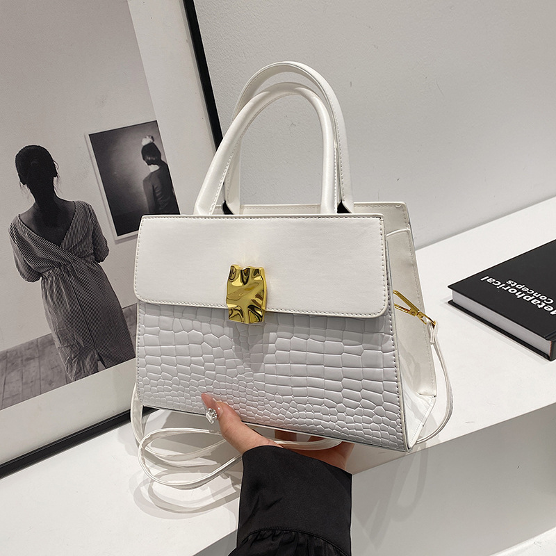 Bolso de mano con patrón de cocodrilo de alta gama de moda coreana para mujer 2024 otoño nuevo diseño de nicho pequeño bolso cuadrado de cercanías