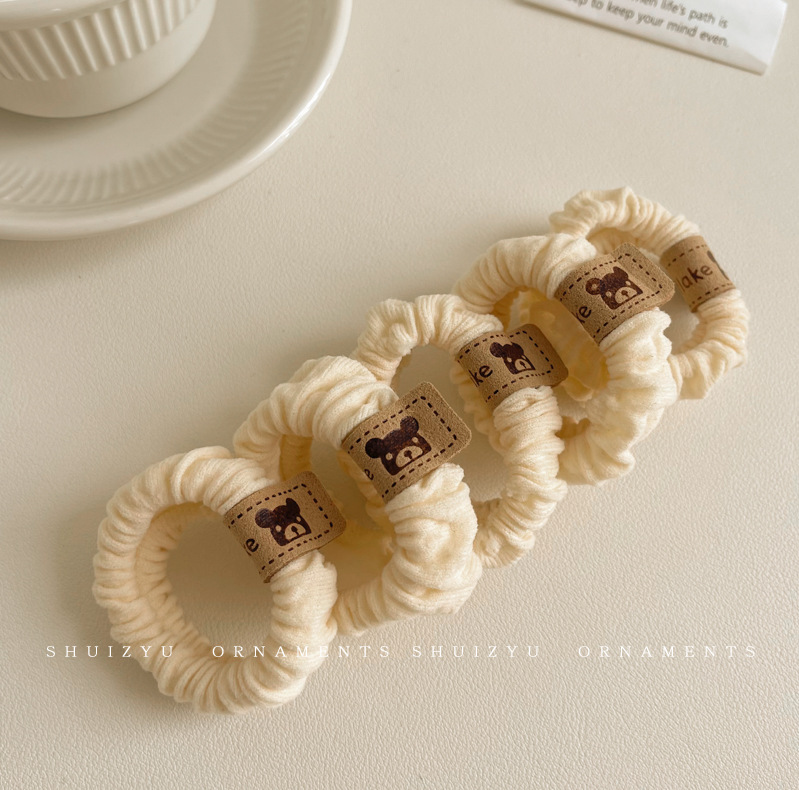 Alta elasticidad y durabilidad como correa de goma para mujeres, color curry simple, cuerda de cabello de cola de caballo alta, anillo de cabello sin heridas de alta calidad