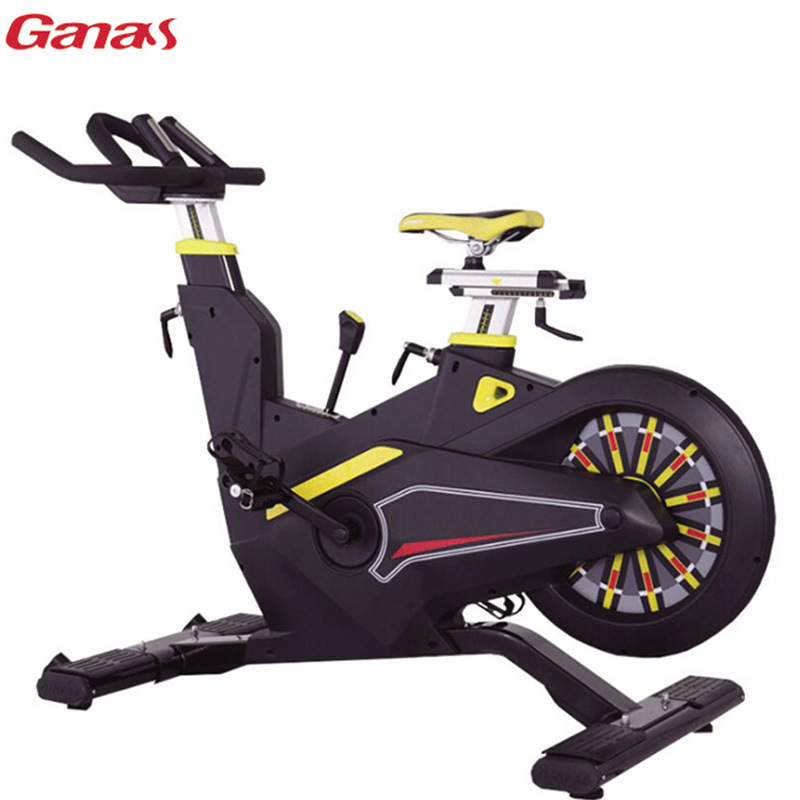 Bicicleta de spinning comercial Jianas con control magnético y volante trasero, bicicleta de ejercicio ultra silenciosa con engranajes ajustables.