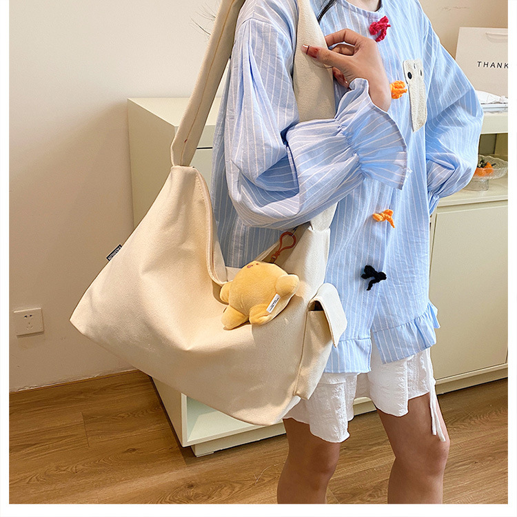 The 2024 new Korean-style simple and laid-back casual canvas crossbody bag and the large-capacity versatile tote bag are selling well undefined