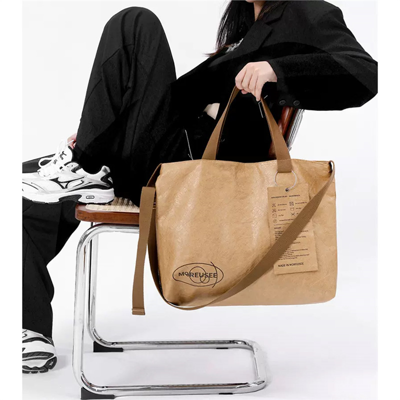 杜邦纸袋定 制印图案logo手提斜跨包单肩包防水两用高端礼品定 做