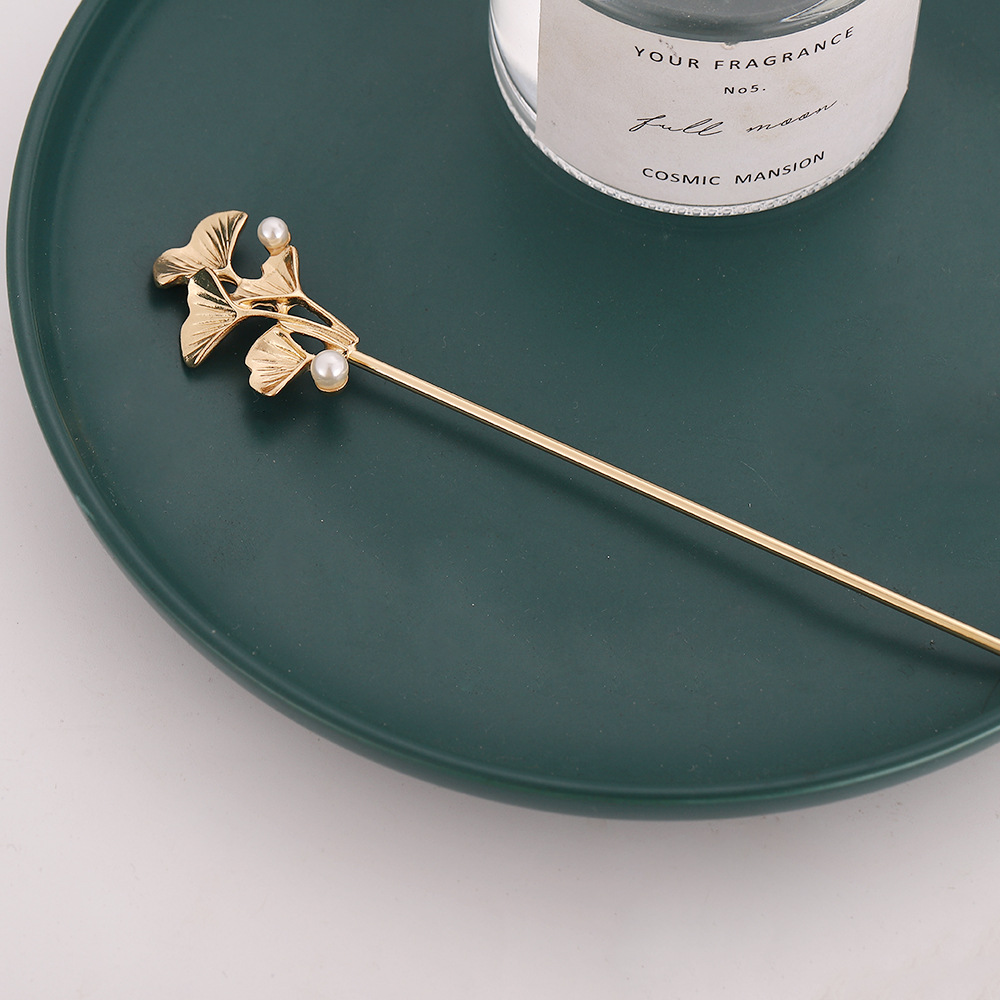 Ciervo blanco mismo estilo cola de pez perla horquilla hembra verano placa horquilla simple temperamento moderno tocado borla mapache horquilla