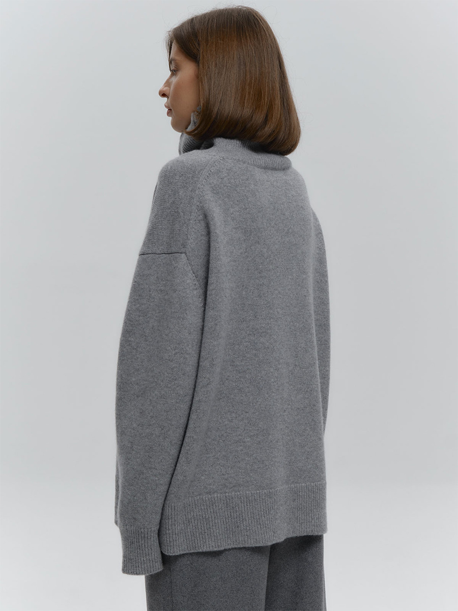 Suéter suelto de cuello alto transfronterizo Europa y los Estados Unidos 2025 otoño y invierno nuevo simple camisa de punto de color sólido abrigo abrigo suéter de cabeza mujer