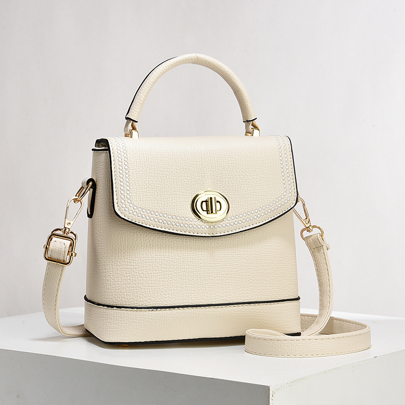 Bolso de mujer nuevo nicho de diseño texturizado bolso de hombro de moda moda bolso de mano práctica mochila bolsas