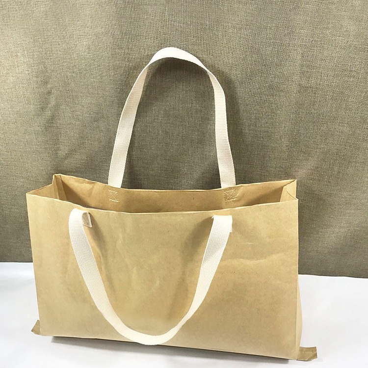 现货牛皮纸手提袋通用包装礼品袋时尚纸塑编织食品购物袋批发